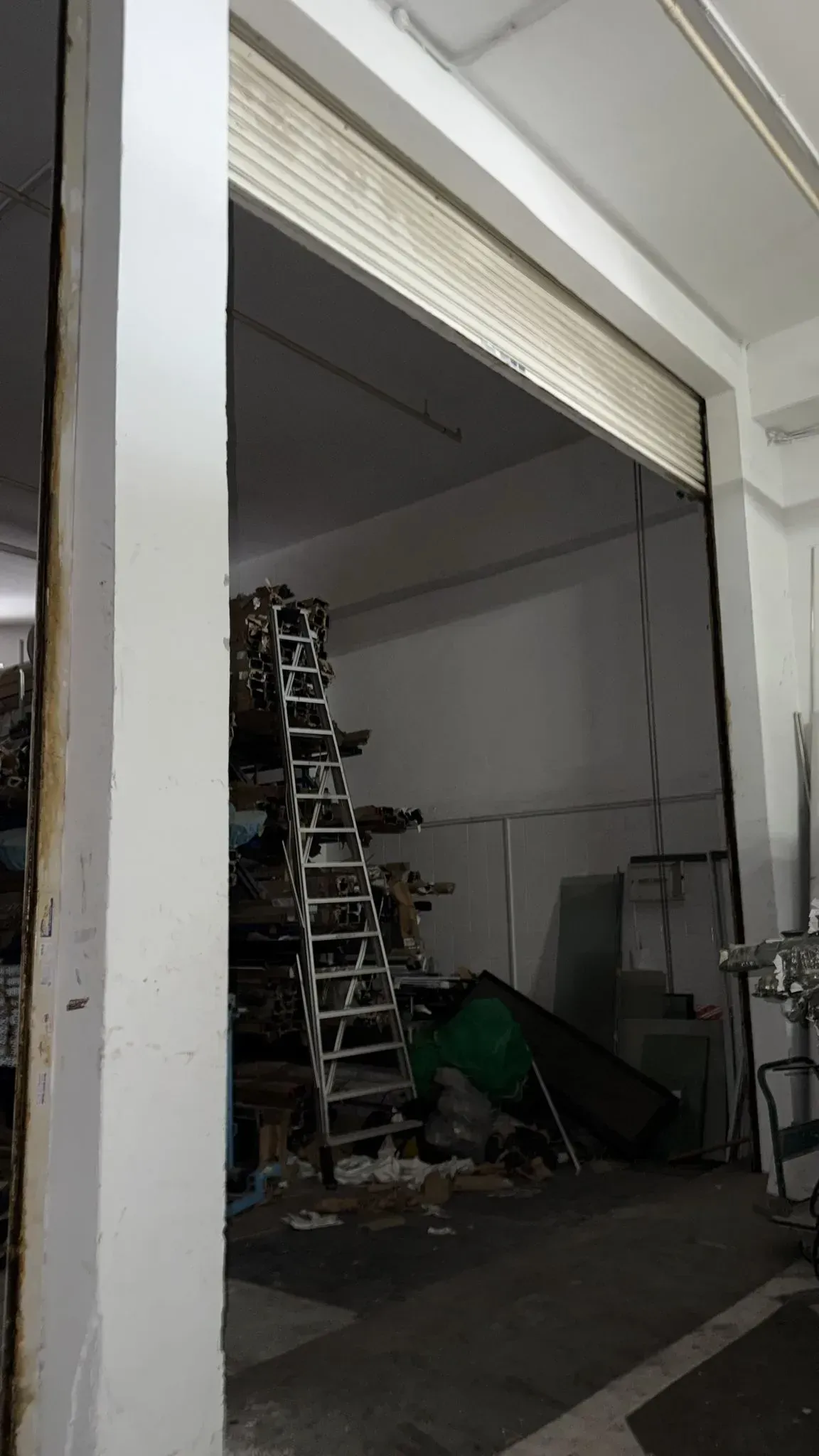 Emergency Off-Track Roller Shutter Slats Repair & Realignment Project Image in Singapore - Roller Shutter Specialist