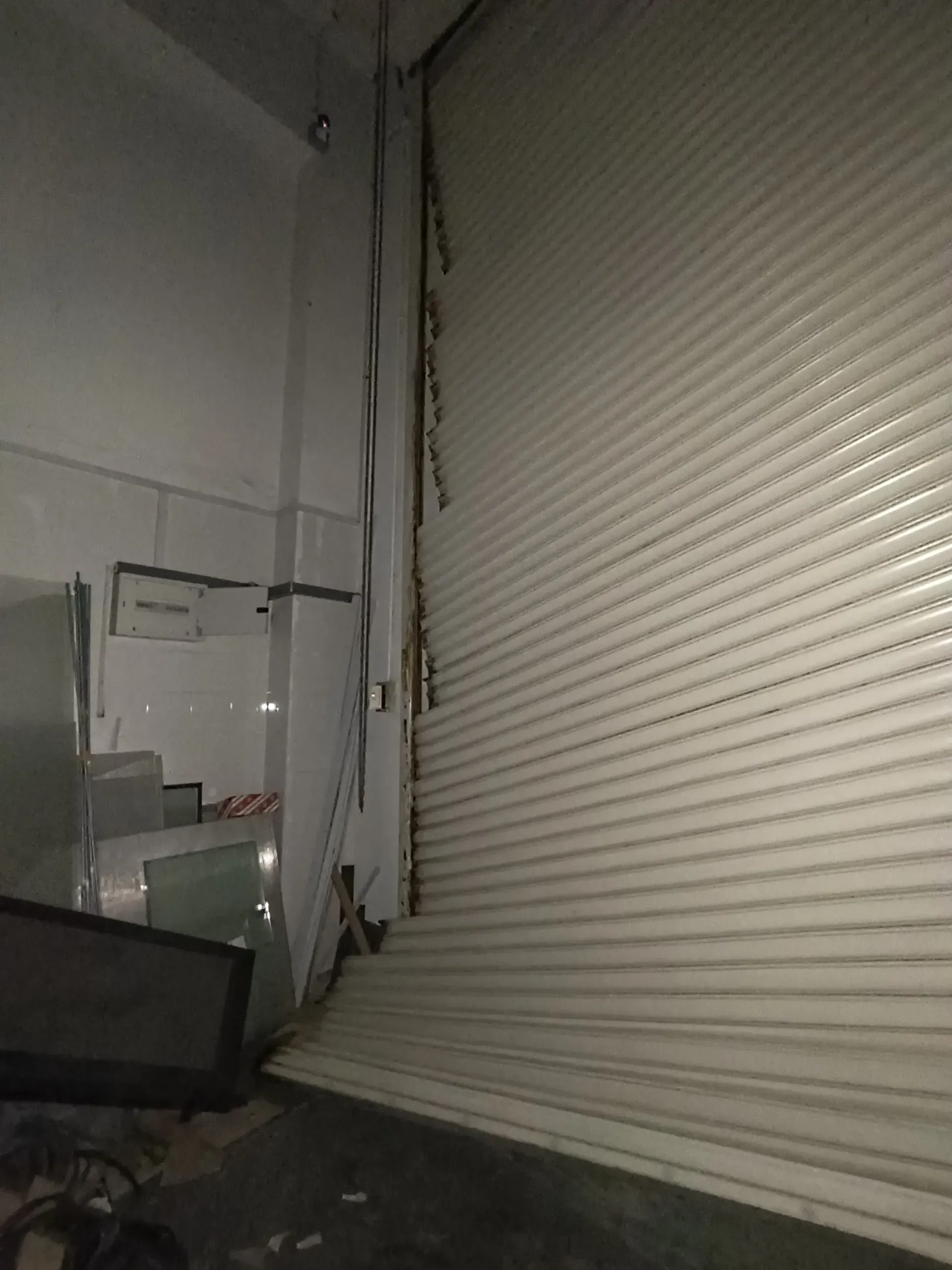Emergency Off-Track Roller Shutter Slats Repair & Realignment Project Image in Singapore - Roller Shutter Specialist