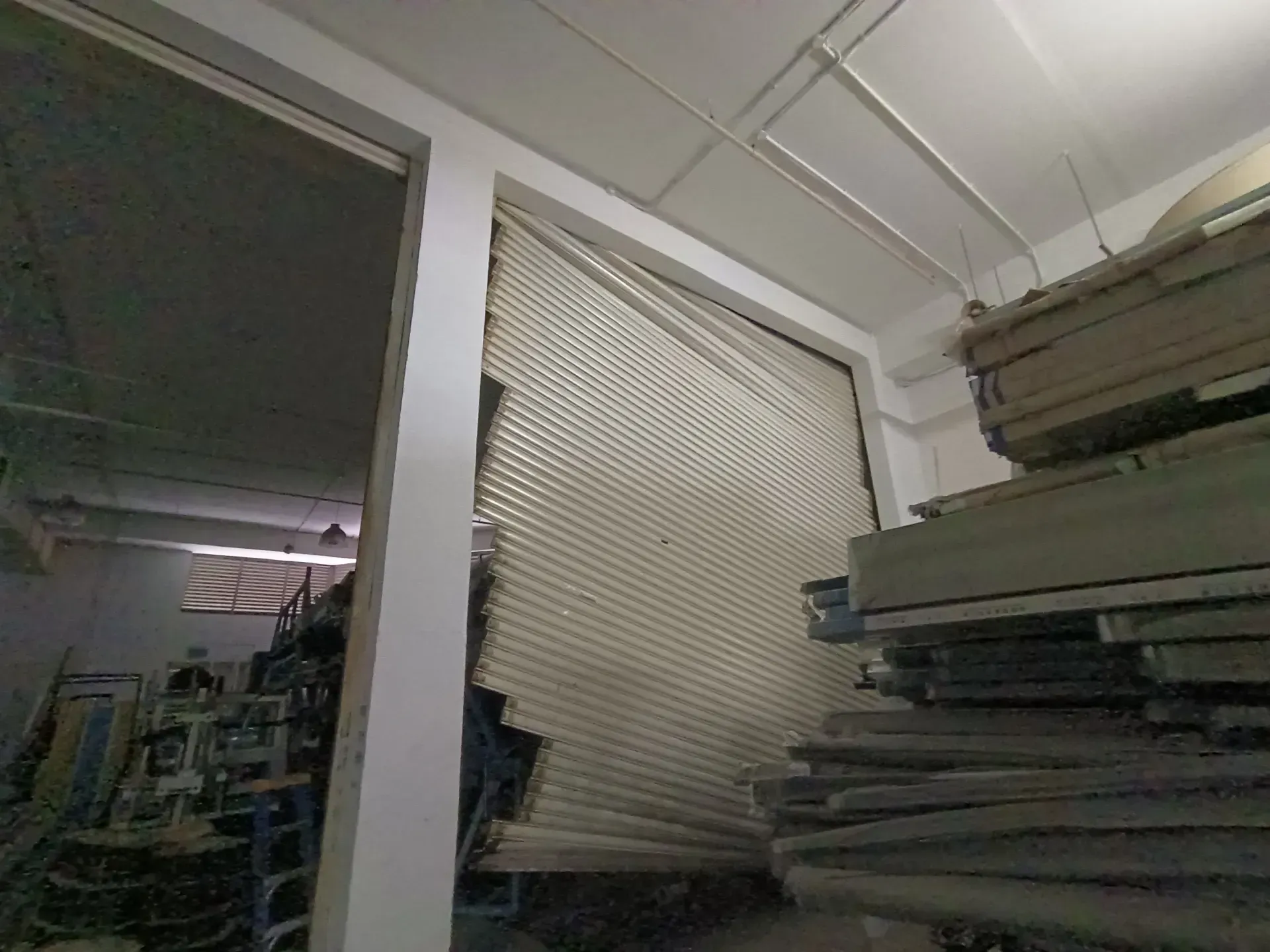 Emergency Off-Track Roller Shutter Slats Repair & Realignment Project Image in Singapore - Roller Shutter Specialist
